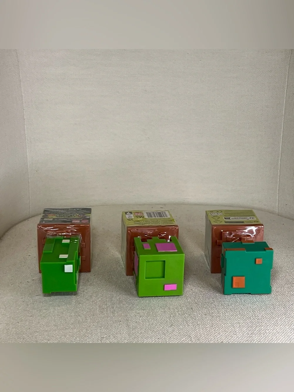 Mattel Minecraft Bloom Blocks Mini Figures in Bright Green, Brown, Teal, Pink